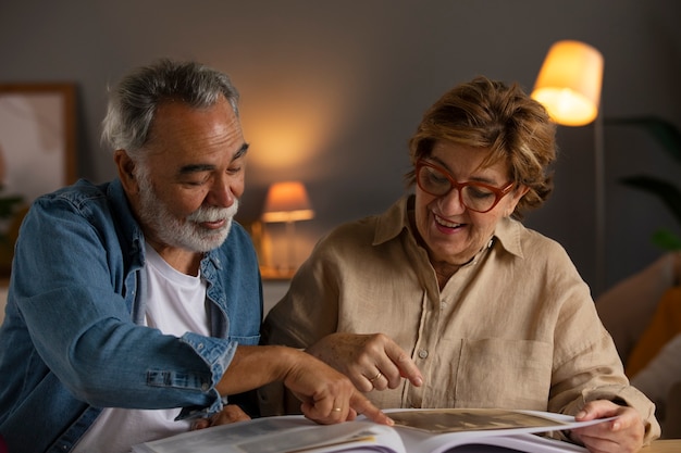 People looking over picture album