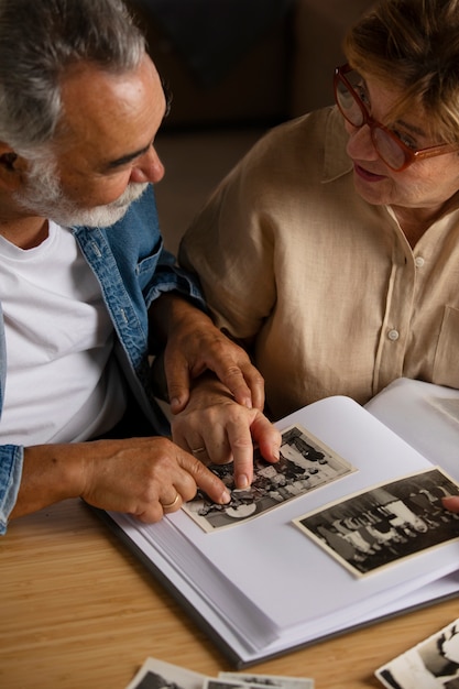 People looking over picture album