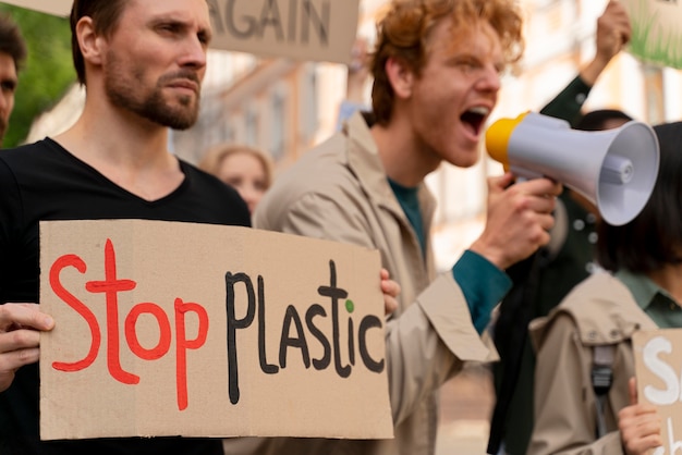 Free photo people marching in global warming protest