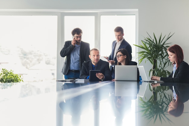 Free photo people in meeting room having conference