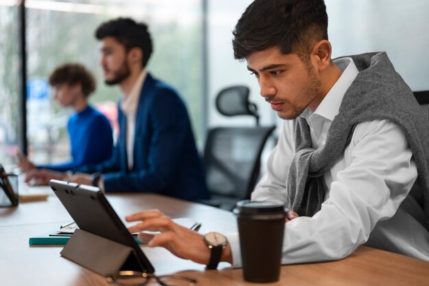 People in the office analyzing and checking finance graphs