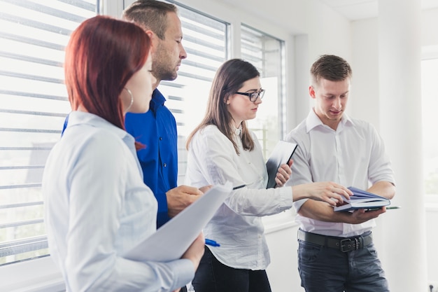 Free photo people in office listening to presentation