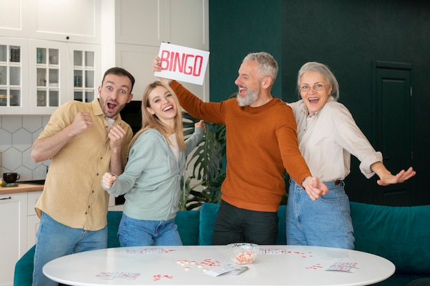 Free photo people playing bingo together