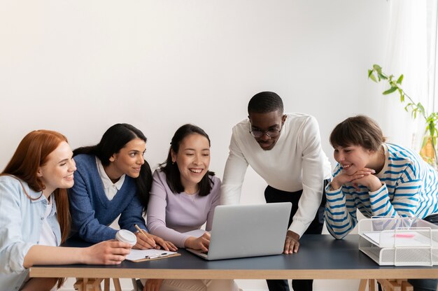 People practicing social integration in workspace