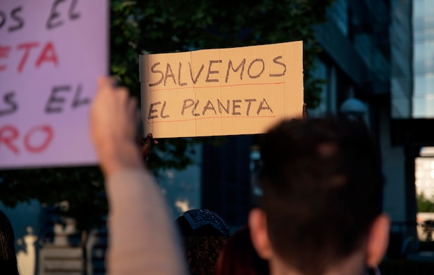 People protesting with placards