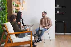 Free photo people resting in office together