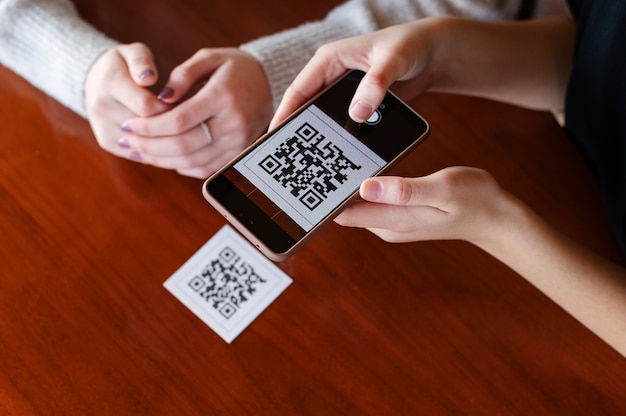 Free Photo people scanning qr code