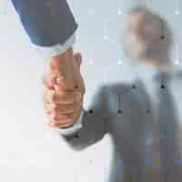 Free photo people shaking hands in business agreement background