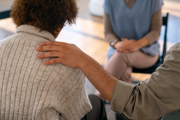 Free photo people sharing feelings and emotions during group therapy session