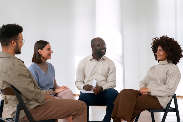 People sharing feelings and emotions during group therapy session