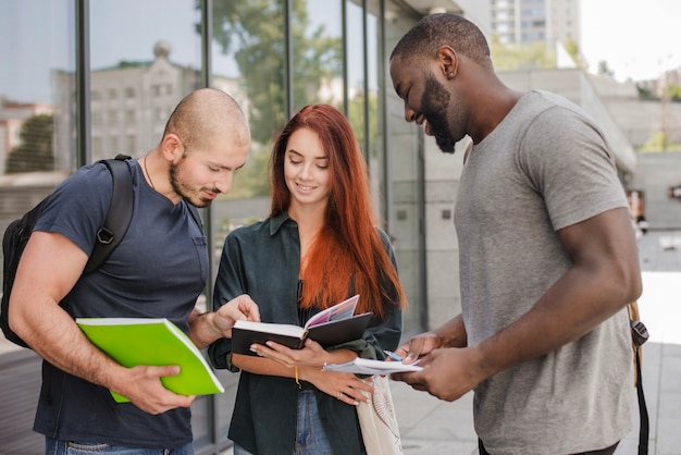 People standing with papers