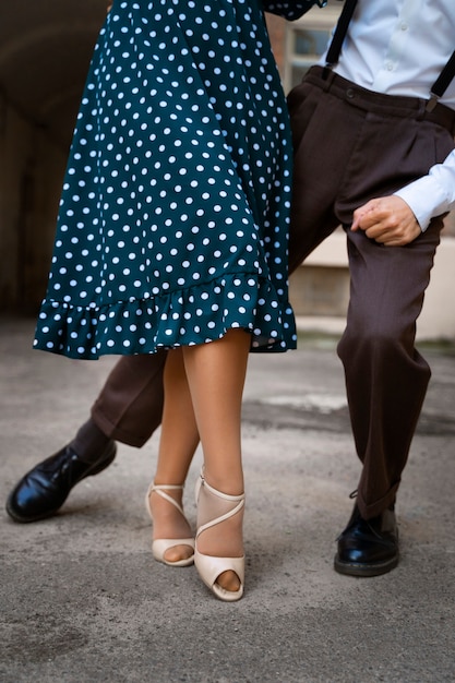 People swing dancing together front view