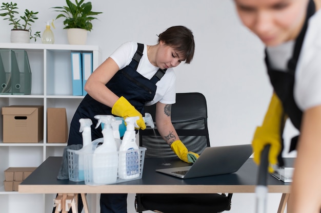 People taking care of office cleaning