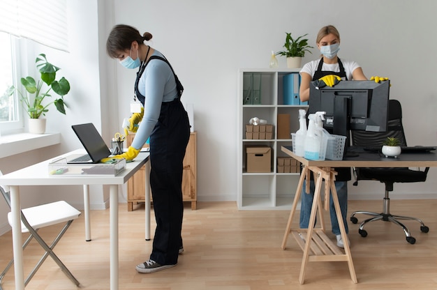 People taking care of office cleaning