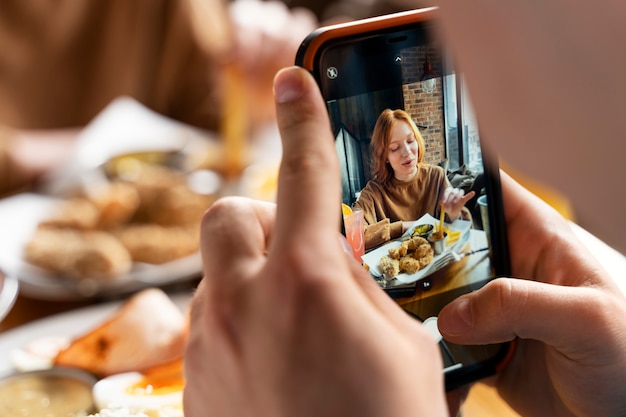 People taking photos of food