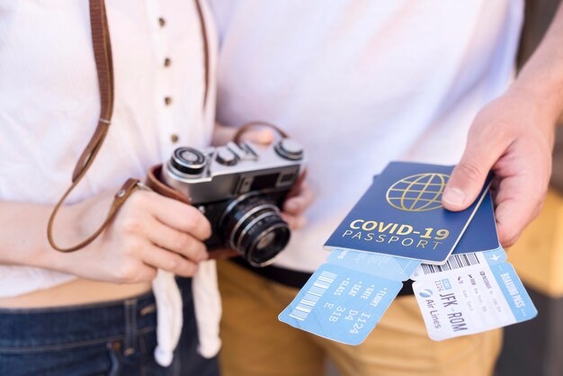 People taking photos of health passports