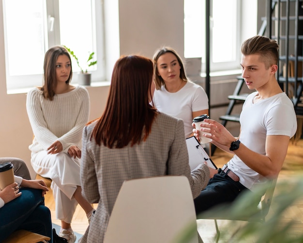 People at therapy meeting medium shot