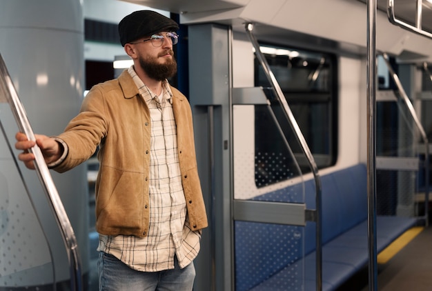 People traveling on the subway in winter time