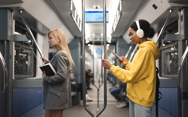 People traveling on the subway in winter time