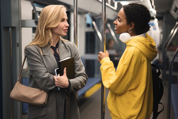 People traveling on the subway in winter time