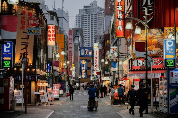 People walking on japan street at nighttime