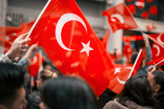 Free Photo people waving turkish flag at the commemoration of ataturk youth and sports day