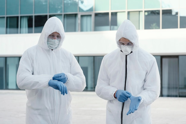 People wearing prevention suits against a bio-hazard