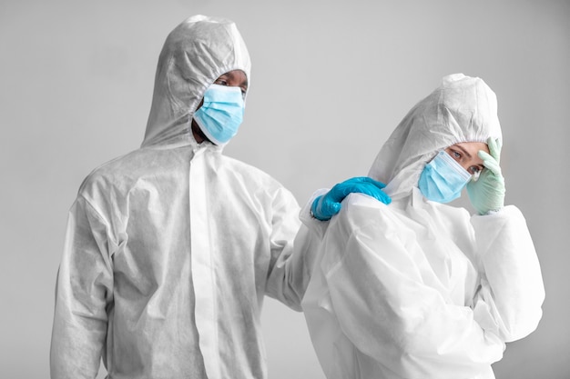 People wearing protective suit in a biohazard area