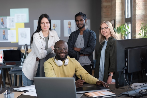 Free photo people working together in an animation studio