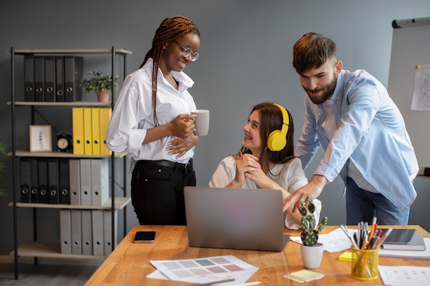 Free photo people working together in a startup company