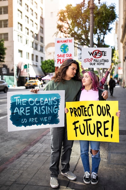 Free Photo people at a world environment day protest outdoors with placards