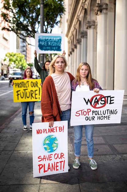 Free Photo people at a world environment day protest outdoors with placards