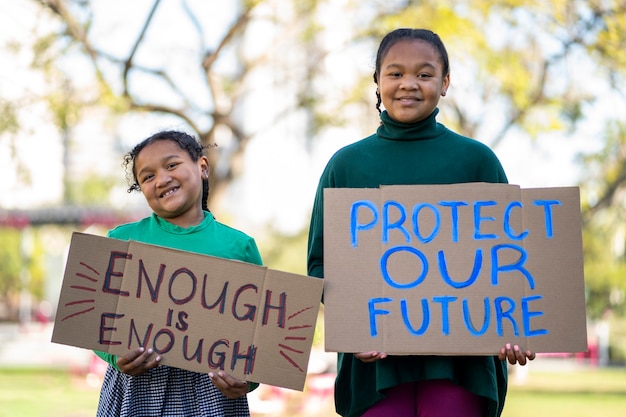 People at a world environment day protest with placards