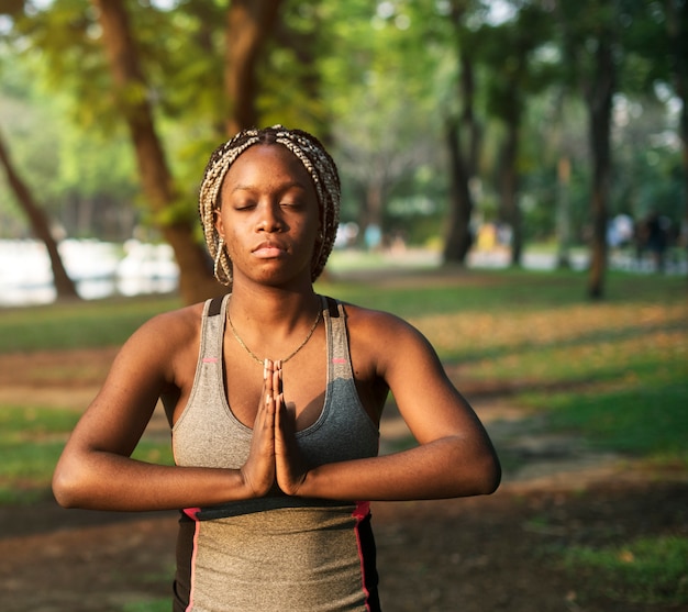 People yoga in a park