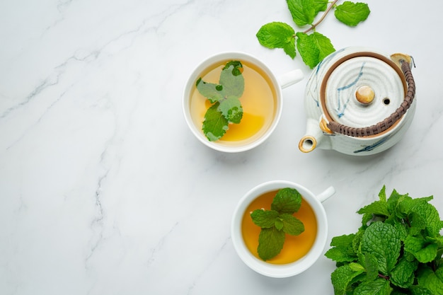 Peppermint tea in glass ready to drink