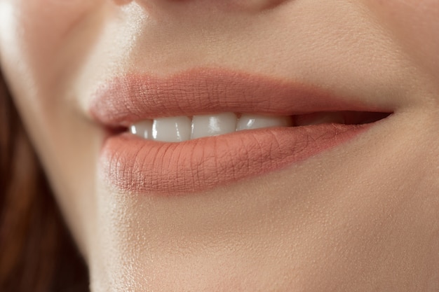 Free photo perfect lips. sexy girl mouth close up. beauty young woman smile. natural plump full lip. lips augmentation.