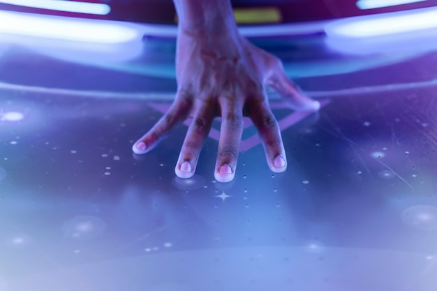 Free Photo performer's hand touching concert stage closeup