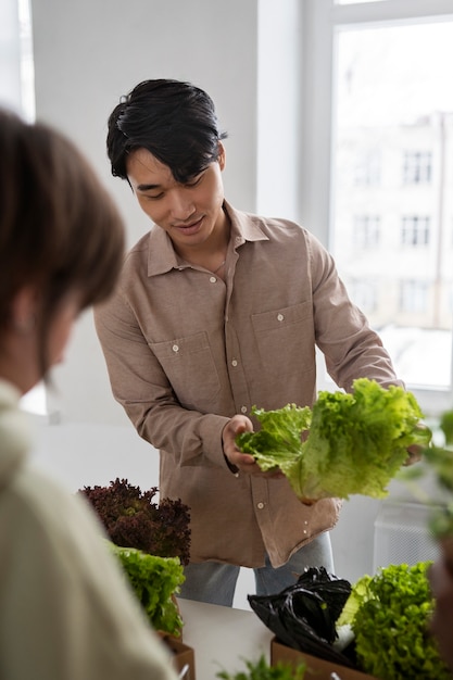 Person at a barter event exchanging goods