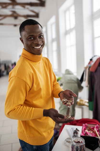 Free Photo person at a barter event exchanging goods