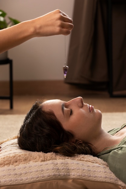 Person conducting reiki therapy