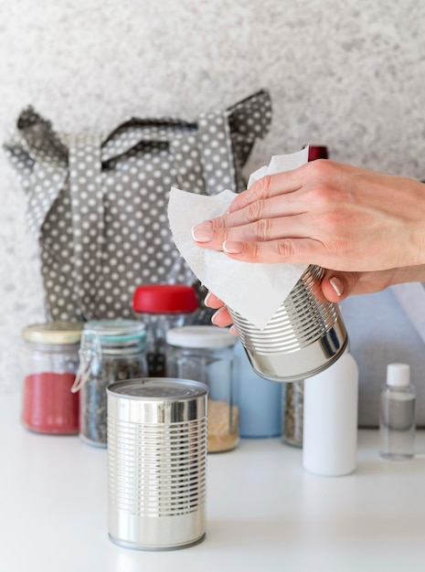 Person disinfecting surfaces