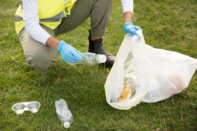 Person doing community service by collecting trash