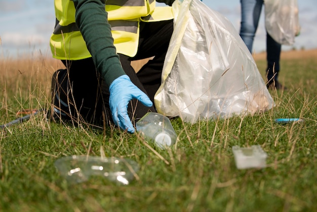 Person doing community service by collecting trash