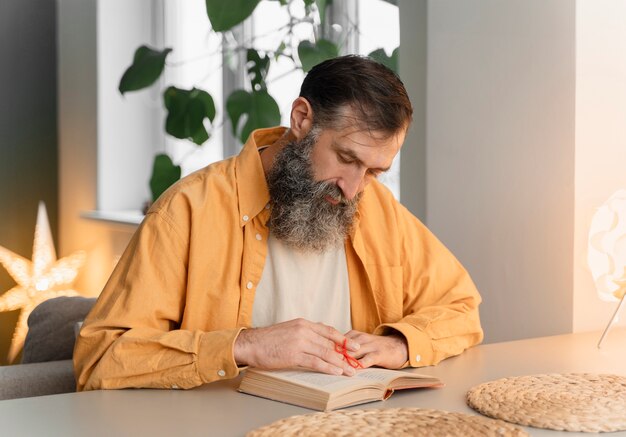 Person doing day-to- day activity while waring string on finger to remember something important