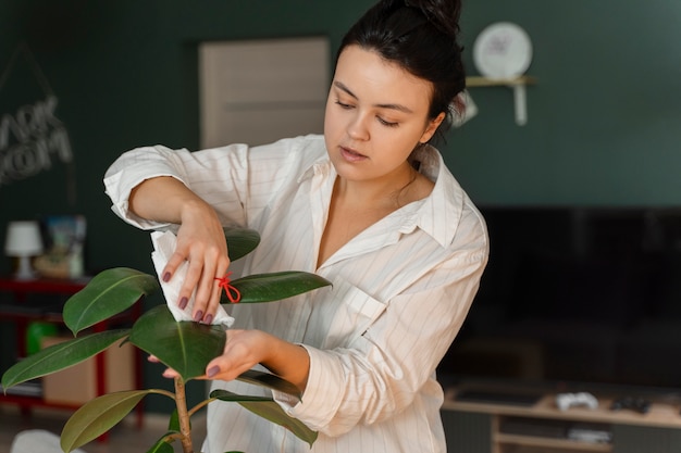 Free Photo person doing day-to- day activity while waring string on finger to remember something important