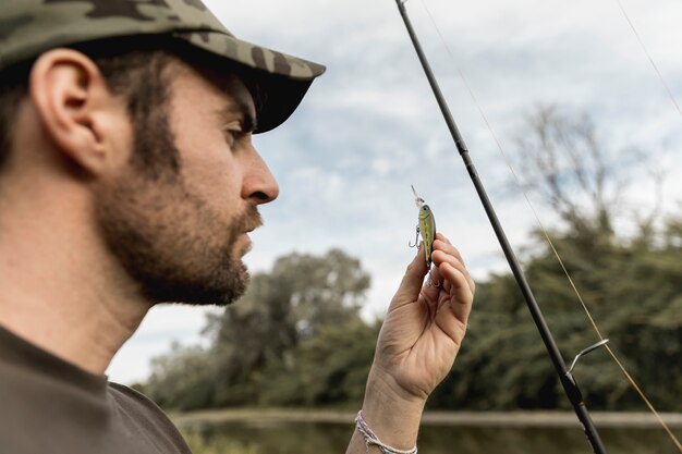 Person fixing a fish hook