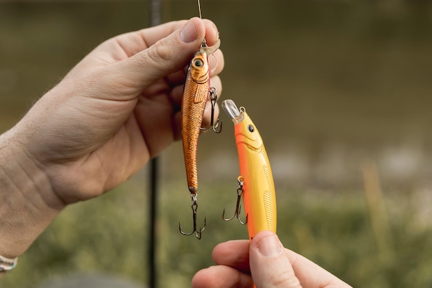 Person fixing a fish hook