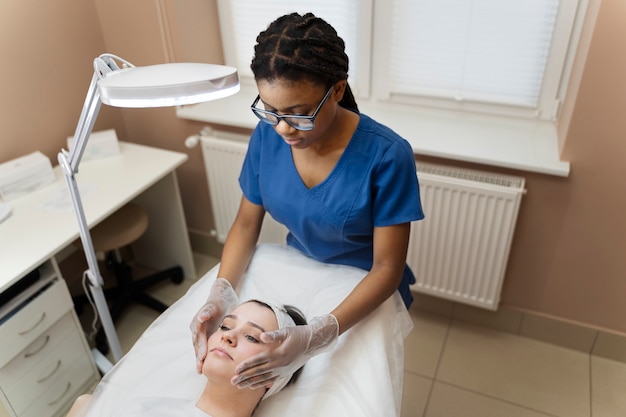 Person getting micro needling beauty treatment