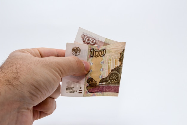 Person holding a banknote