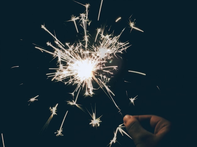 Person holding a sparkler